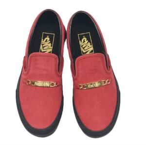 Red vans with gold plate